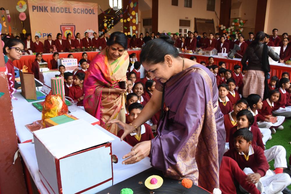 Students reading and learning at Pink Model School Bikaner